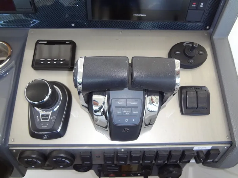 Slide: The Image of Control panel of 2021 Cruisers Yachts 39 Express Coupe with Raymarine radio. - 44