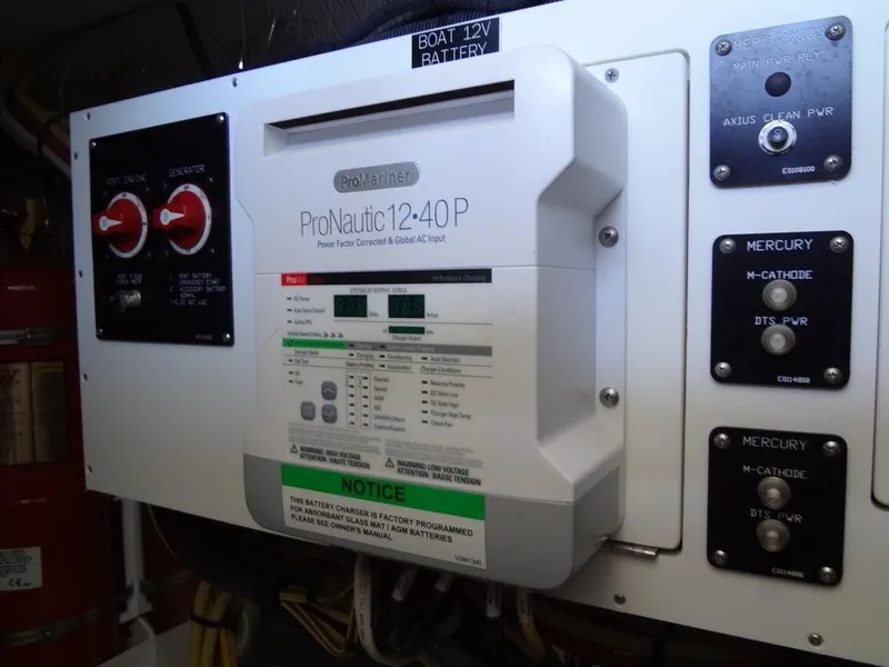 Slide: The Image of Luxurious 2021 Cruisers Yachts 39 Express Coupe kitchen with modern appliances and sleek cabinetry. - 61