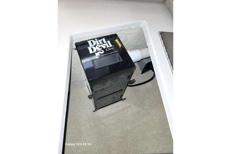 Slide: The Image of Dirt Devil CV1500 vacuum system in 2021 Cruisers Yachts 39 Express Coupe. - 69