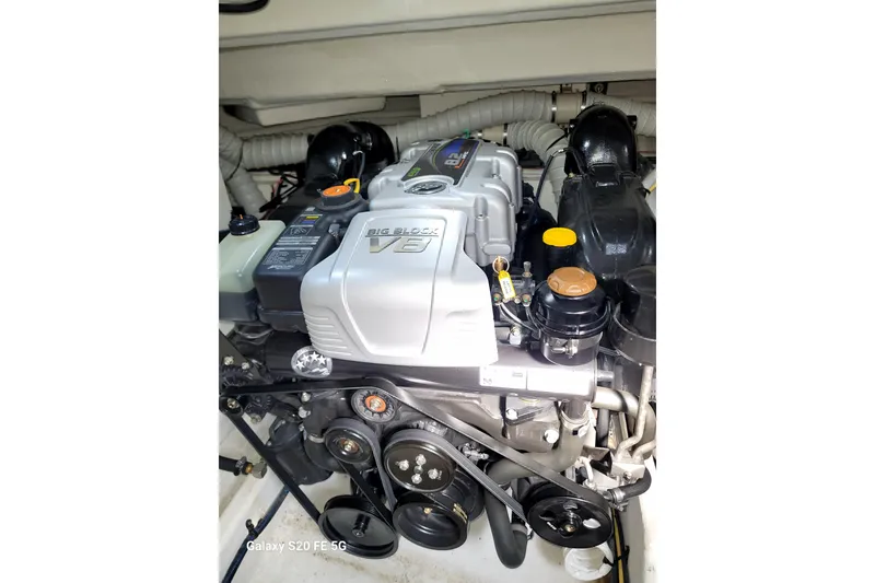 Slide: The Image of 2021 Cruisers Yachts 39 Express Coupe engine, featuring a powerful Big Block V8. - 71