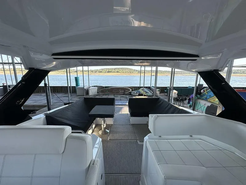 Slide: The Image of 2021 Cruisers Yachts 39 Express Coupe docked in marina. - 17