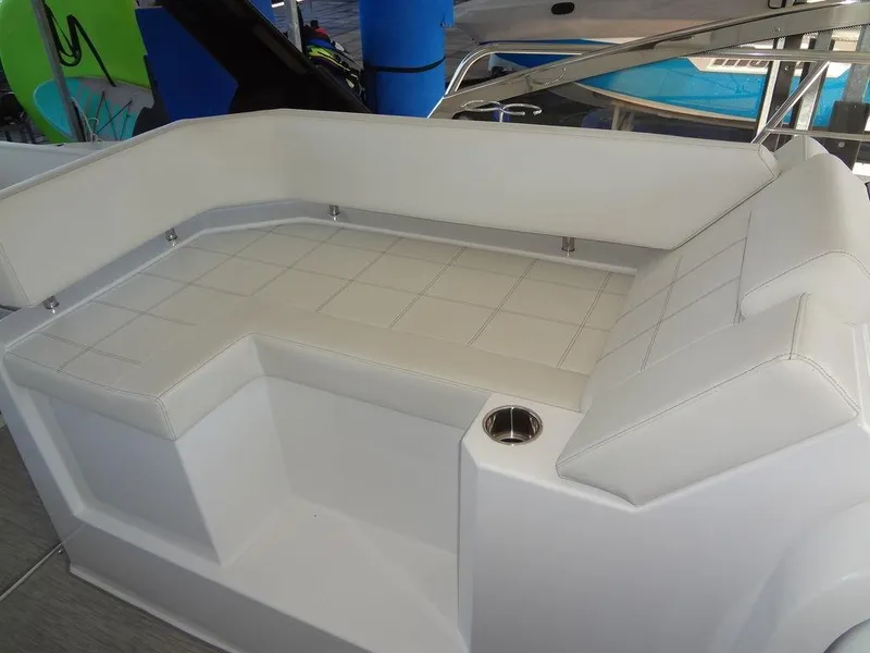 Slide: The Image of 2021 Cruisers Yachts 39 Express Coupe, white leather seating detail. - 40