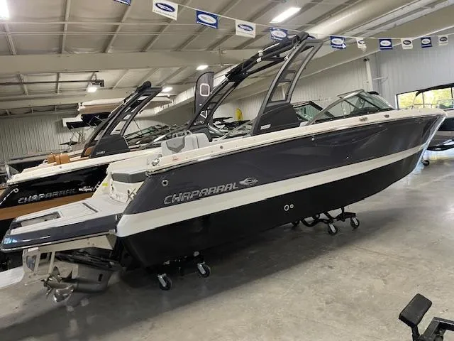 The Image of 2025 Chaparral 247 SSX boat in showroom, sleek design, modern features. - 0