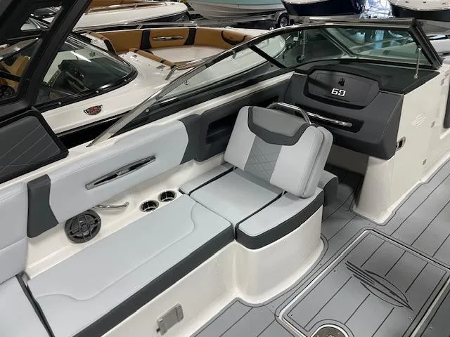 Slide: The Image of 2025 Chaparral 247 SSX boat interior with sleek seating and modern design. - 9