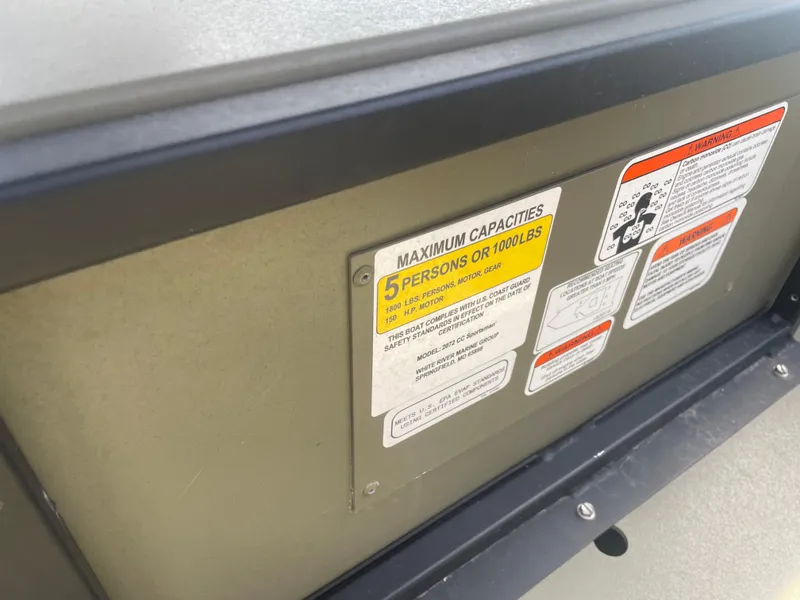 Slide: The Image of Capacity label on 2024 Tracker Grizzly 2072 CC Sportsman boat. - 10