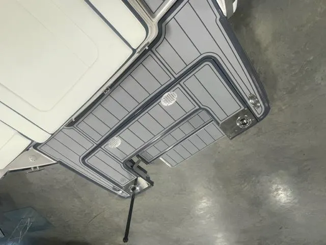Slide: The Image of 2024 Chaparral 247 SSX boat deck with gray non-slip surface. - 14