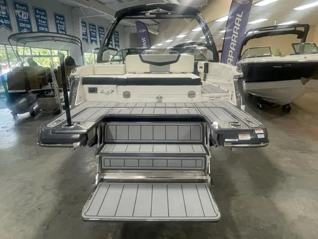 Slide: The Image of 2024 Chaparral 247 SSX boat with extended swim platform and rear seating. - 15