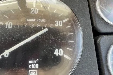 Slide: The Image of Close-up of a 1989 Blue Seas Flybridge Cruiser engine hour gauge showing 1739.78 hours. - 14