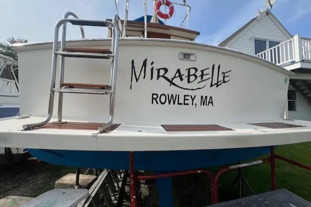 Slide: The Image of 1989 Blue Seas Flybridge Cruiser "Mirabelle" docked in Rowley, MA with ladder and life preserver. - 45