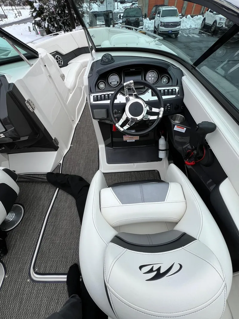 Slide: The Image of 2014 Monterey 268 boat interior with steering wheel and dashboard - 10