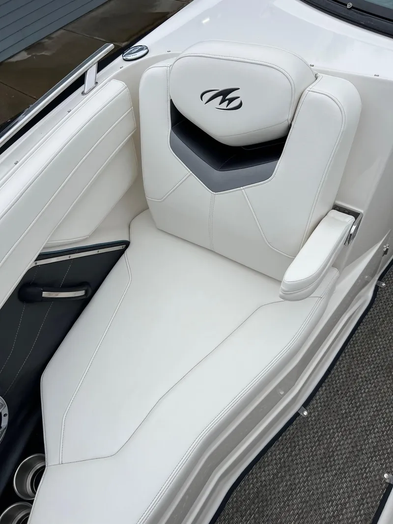 Slide: The Image of 2014 Monterey 268 boat with white leather seating. - 13