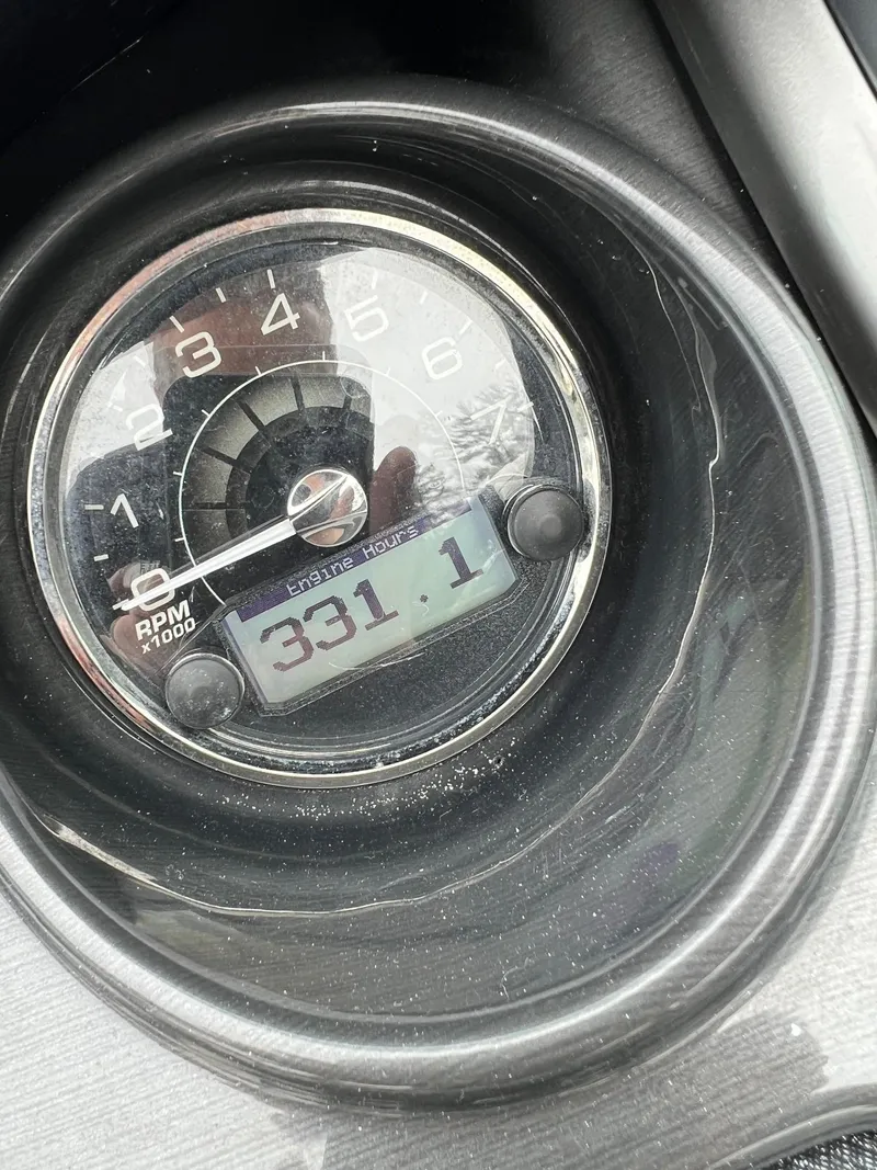Slide: The Image of Close-up of a 2014 Monterey 268 boat tachometer showing 331.1 hours. - 14