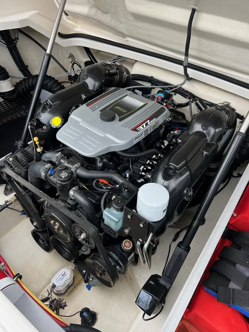 Slide: The Image of 2014 Monterey 268 boat engine compartment with a well-maintained engine. - 16