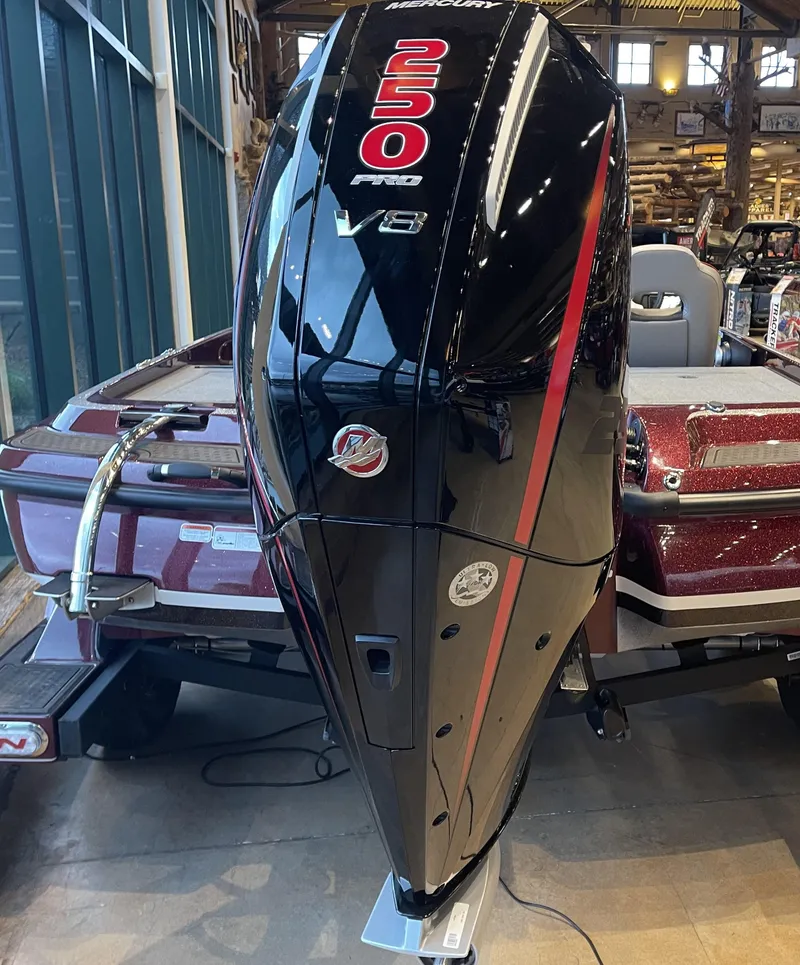 Slide: The Image of 2024 Nitro Z21 XL boat with powerful 250 Pro V8 engine in showroom. - 10