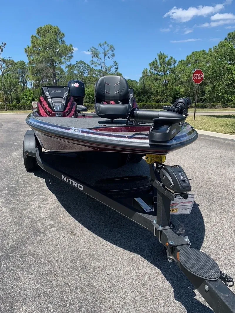 Slide: The Image of 2024 Nitro Z18 fishing boat on trailer in parking lot. - 4