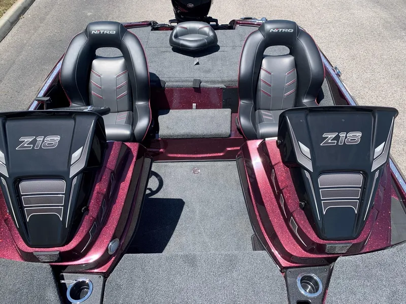 Slide: The Image of 2024 Nitro Z18 boat interior with dual seats and storage compartments. - 5