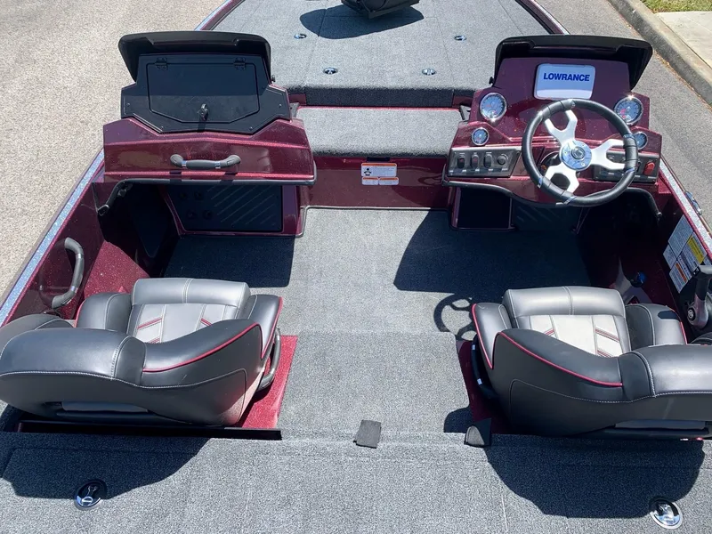 Slide: The Image of 2024 Nitro Z18 boat interior with dual seats and steering console. - 6