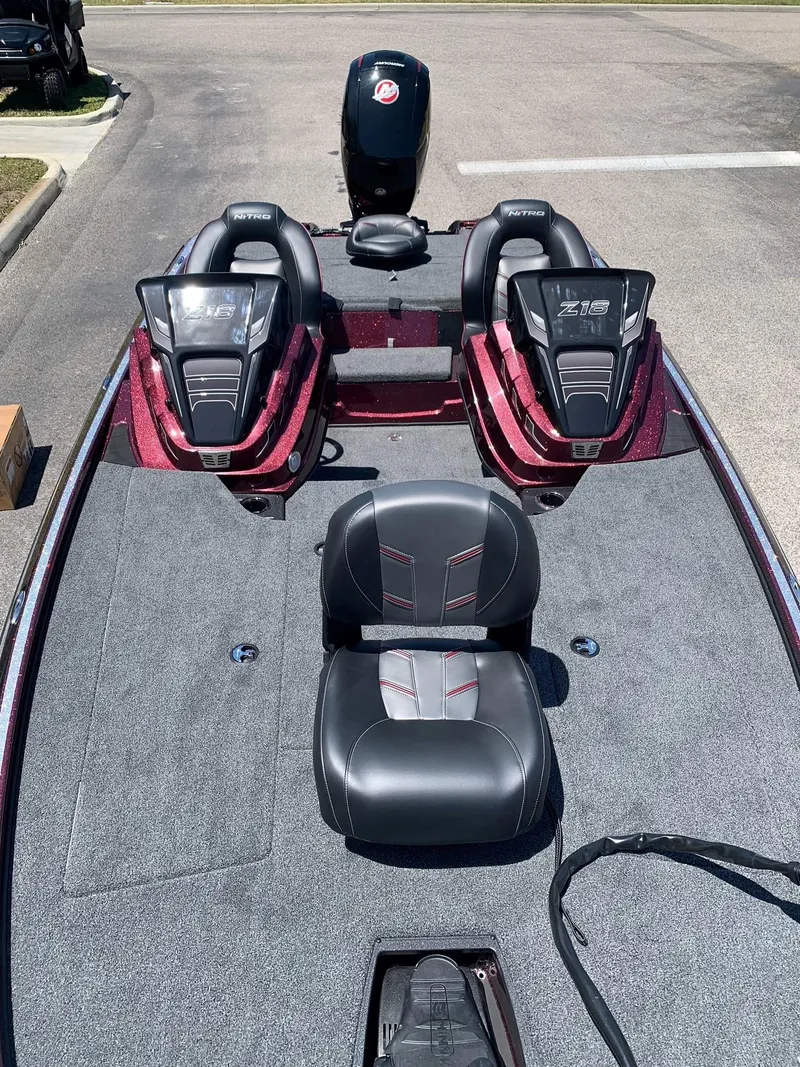 Slide: The Image of 2024 Nitro Z18 fishing boat with dual consoles and seating. - 8