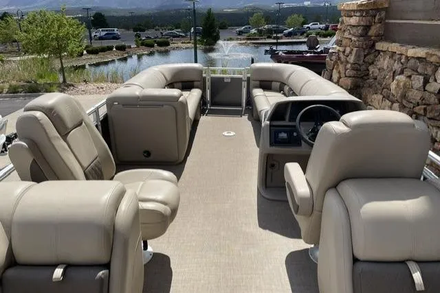 Slide: The Image of 2024 Sun Tracker Party Barge 24 DLX pontoon boat with spacious seating and modern design. - 3