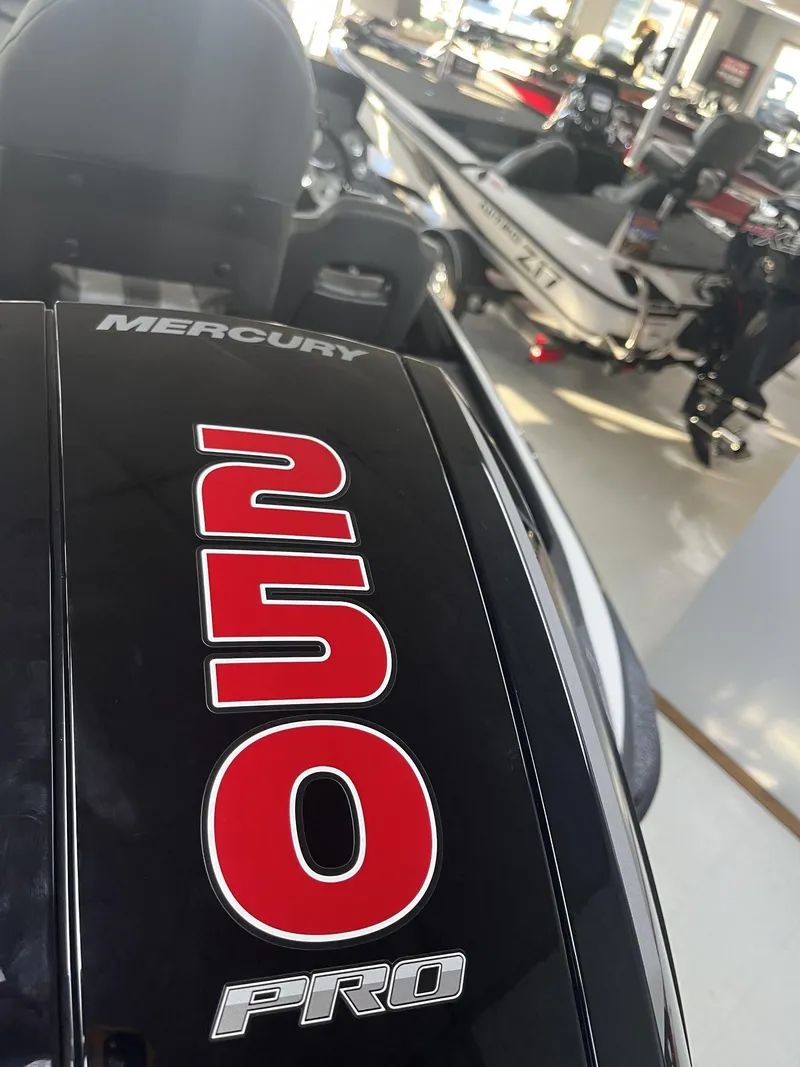 Slide: The Image of Mercury 250 Pro engine on a 2024 Nitro Z20 boat in showroom. - 9
