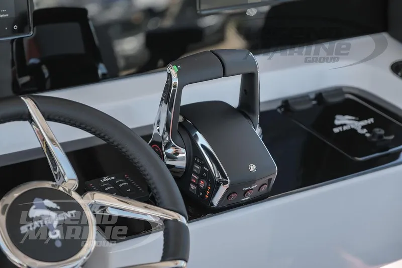 Slide: The Image of Close-up of the 2025 Statement 350 Open boat's steering wheel and throttle controls. - 13