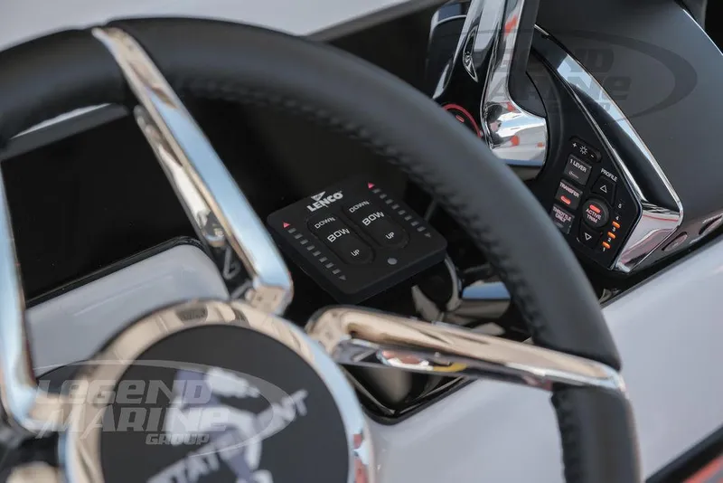 Slide: The Image of Close-up of 2025 Statement 350 Open boat steering wheel and control panel. - 15