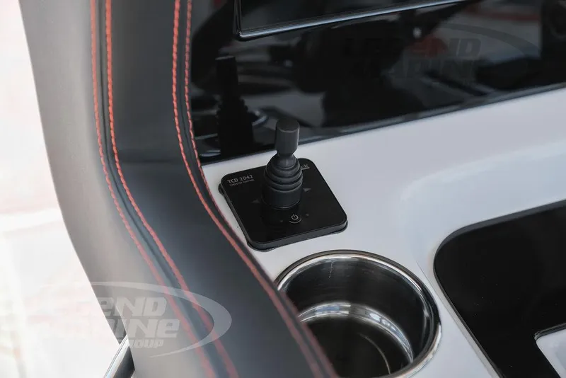 Slide: The Image of Joystick control and cup holder on the 2025 Statement 350 Open boat. - 17