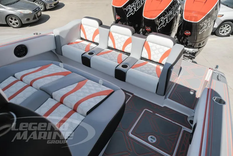 Slide: The Image of 2025 Statement 350 Open boat interior with stylish seating and powerful outboard engines. - 21