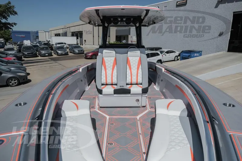 Slide: The Image of 2025 Statement 350 Open boat with modern seating and sleek design in a marina. - 27