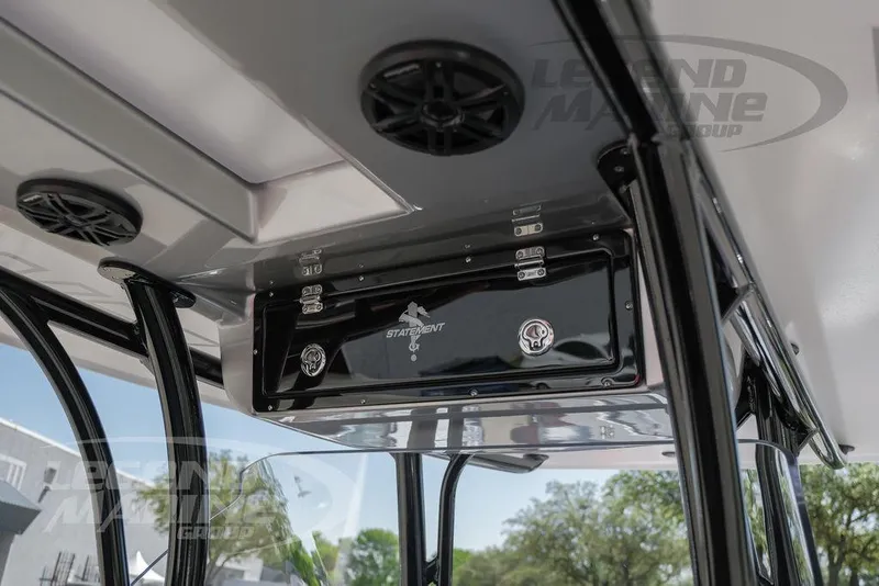 Slide: The Image of 2025 Statement 350 Open boat interior with overhead console and speakers. - 31