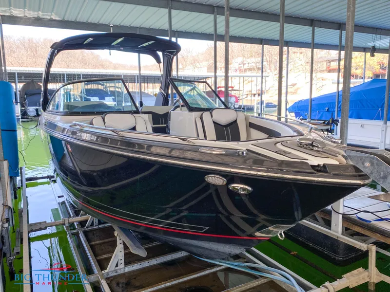 Slide: The Image of 2021 Monterey 278SS boat docked in a marina. - 10