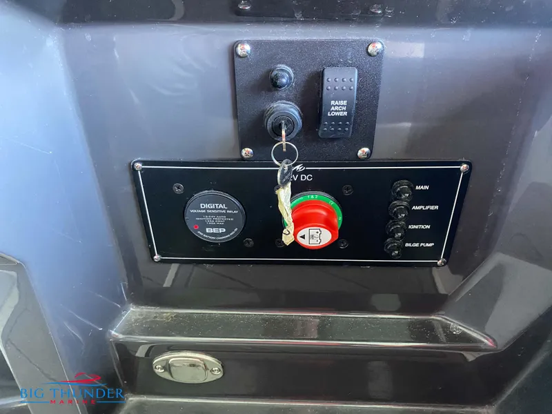 Slide: The Image of 2021 Monterey 278SS boat control panel with ignition key and switches. - 20