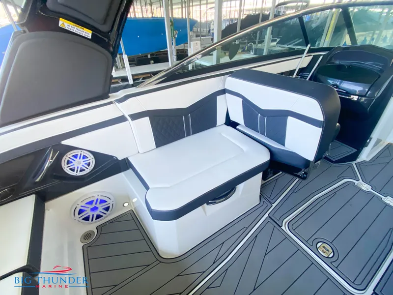 Slide: The Image of 2021 Monterey 278SS boat interior with seating and speakers. - 24