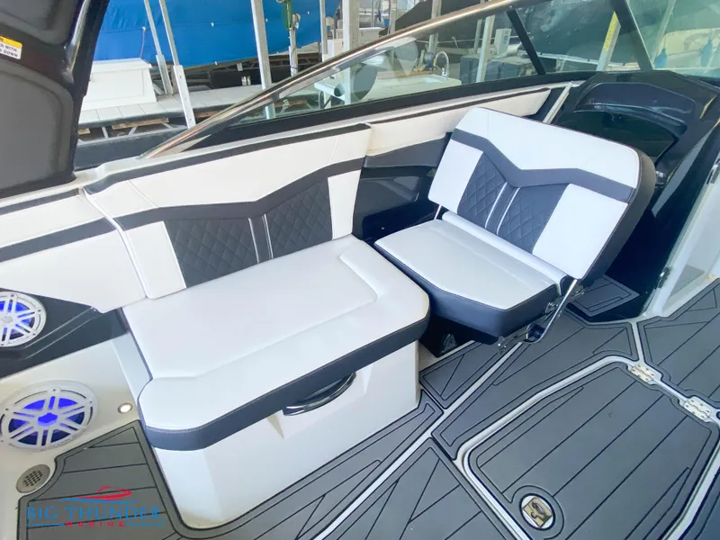 Slide: The Image of 2021 Monterey 278SS boat interior with white and black seating. - 26