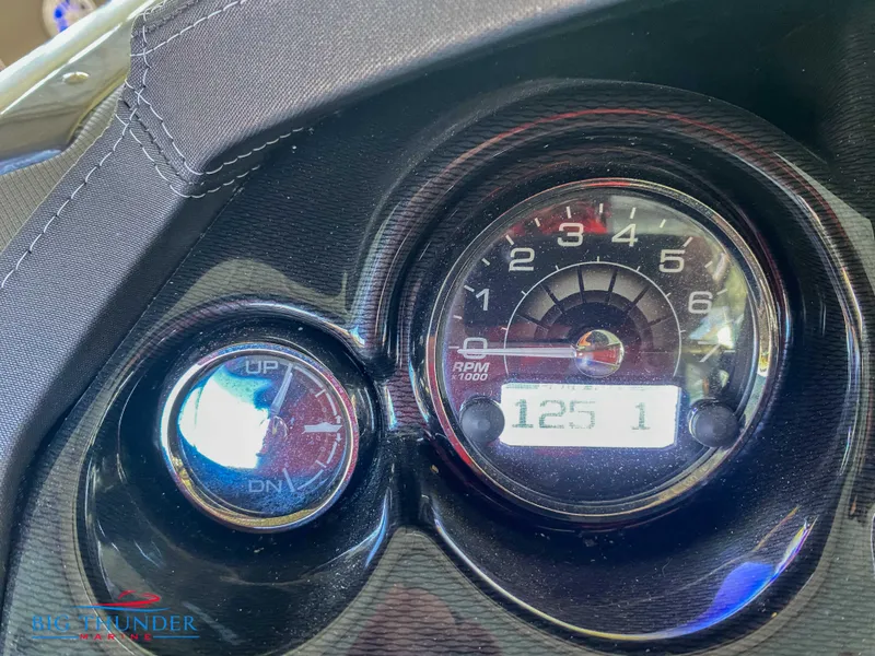 Slide: The Image of Close-up of 2021 Monterey 278SS boat dashboard gauges. - 34