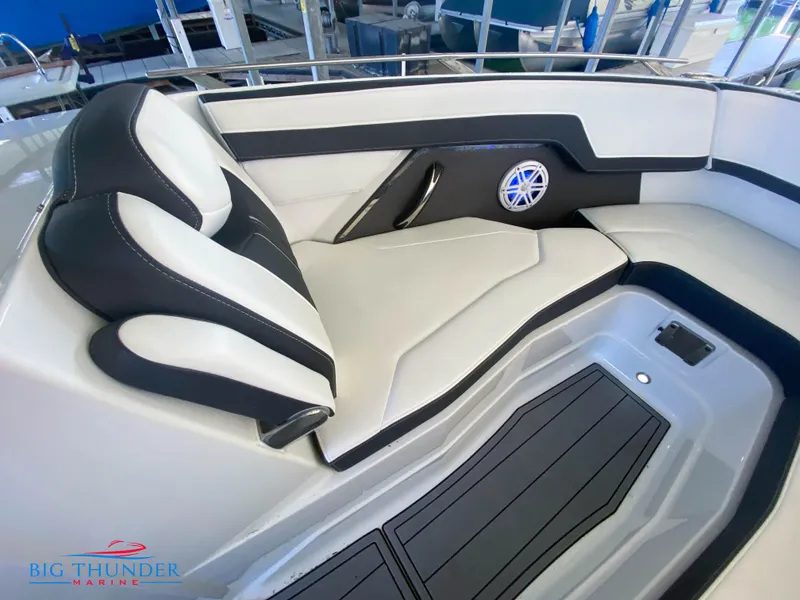 Slide: The Image of 2021 Monterey 278SS boat interior seating with black and white upholstery. - 41