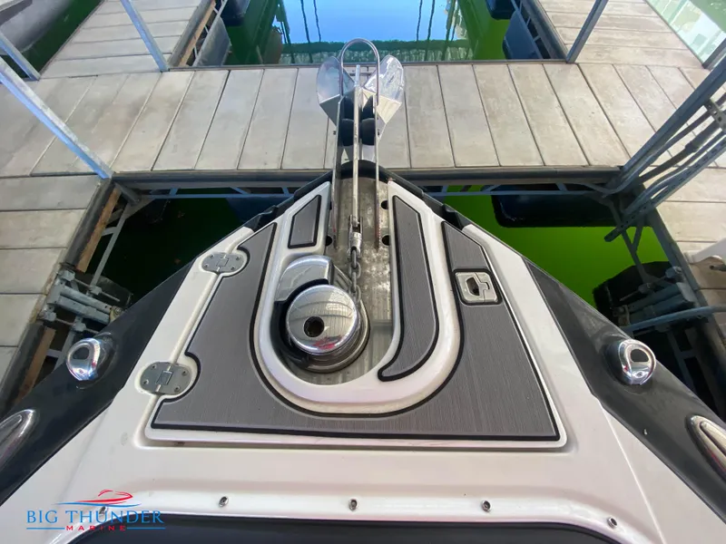 Slide: The Image of 2021 Monterey 278SS boat bow with anchor at dock. - 44