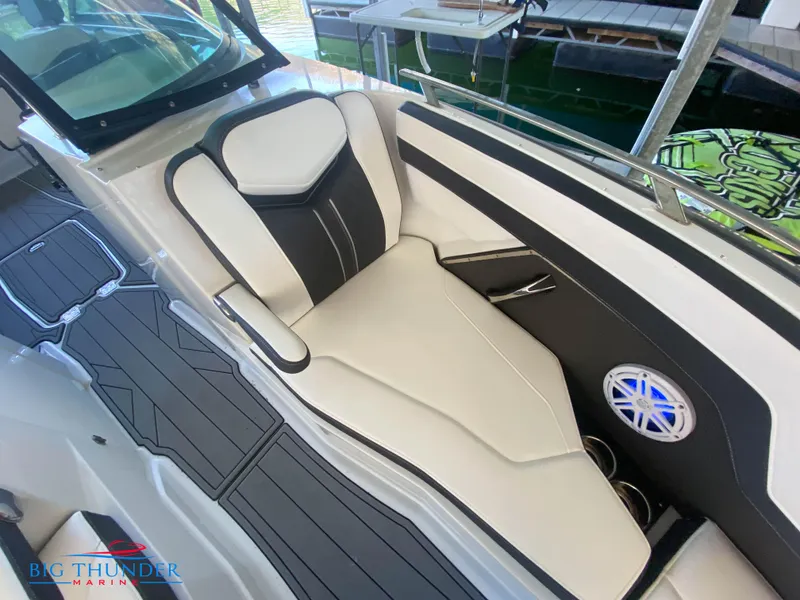 Slide: The Image of 2021 Monterey 278SS boat interior with white and black seating. - 47