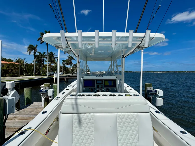 Slide: The Image of 2020 Invincible 36' Open Fisherman boat docked by the water. - 14