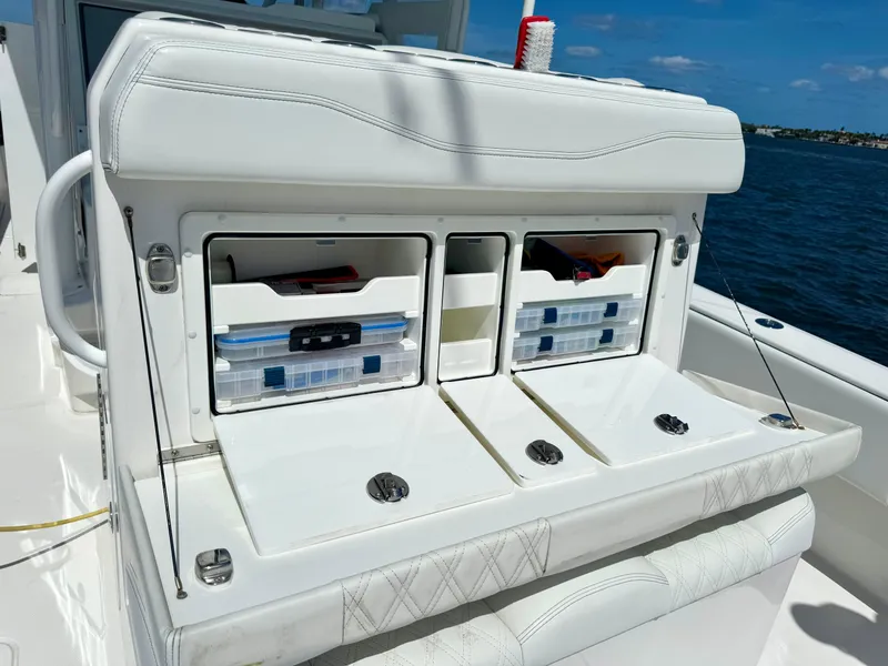 Slide: The Image of 2020 Invincible 36' Open Fisherman boat with organized storage compartments. - 16