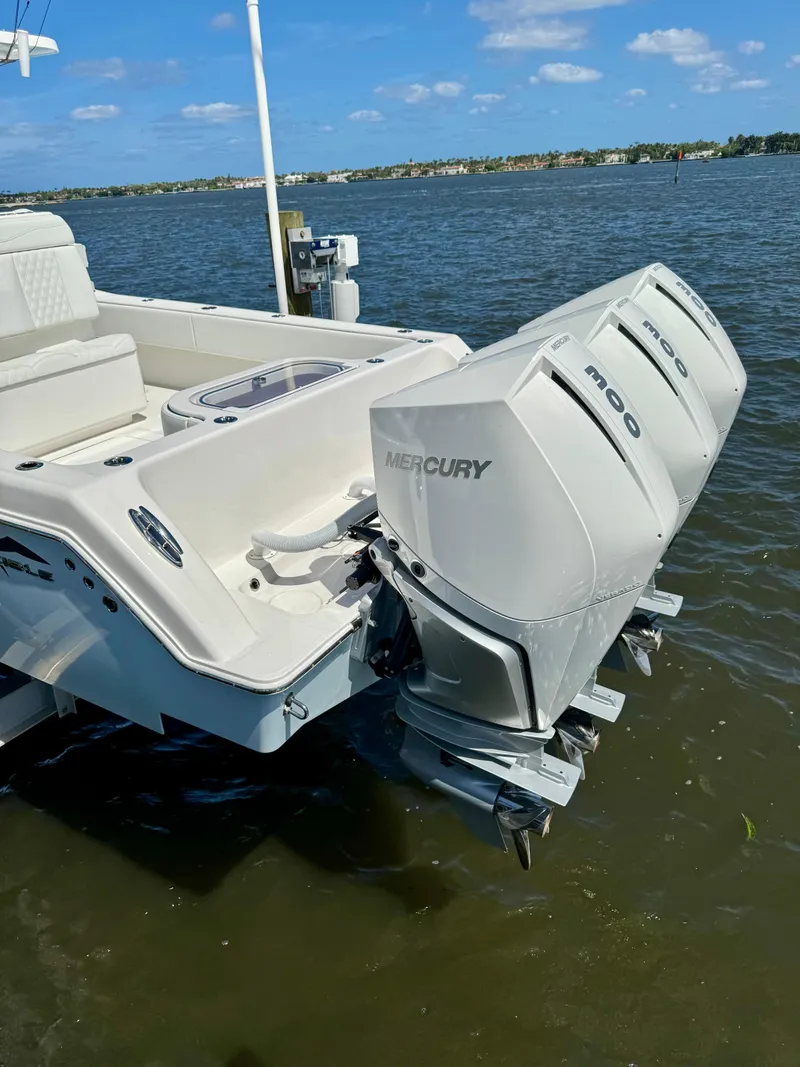 Slide: The Image of 2020 Invincible 36' Open Fisherman with triple Mercury outboard engines. - 21