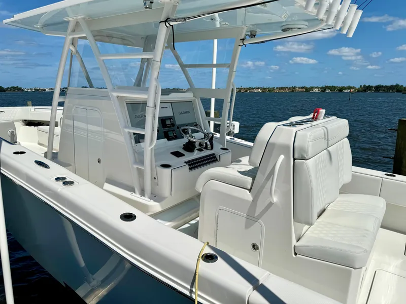 Slide: The Image of 2020 Invincible 36' Open Fisherman boat with white seating and control panel. - 26