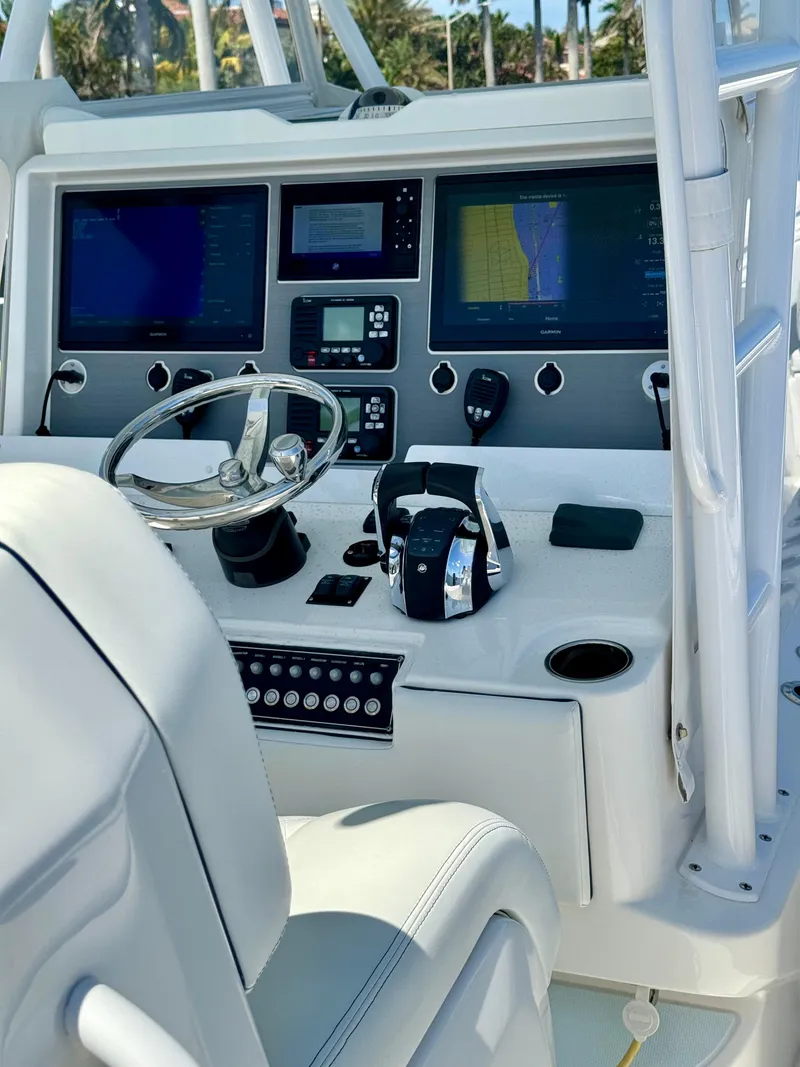 Slide: The Image of Control panel of a 2020 Invincible 36' Open Fisherman boat with advanced navigation systems. - 3