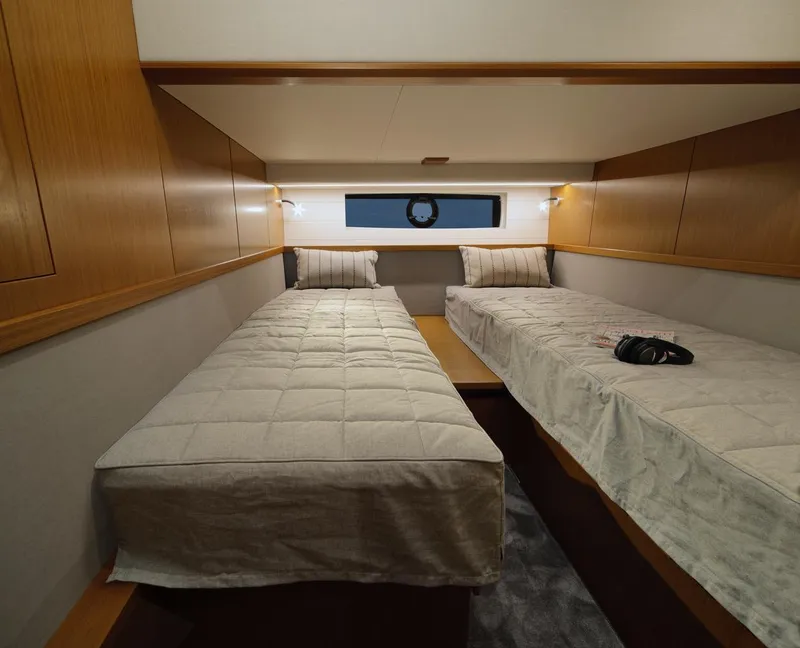 Slide: The Image of Open storage compartment on the 2025 Sargo 45 Cat A boat. - 12