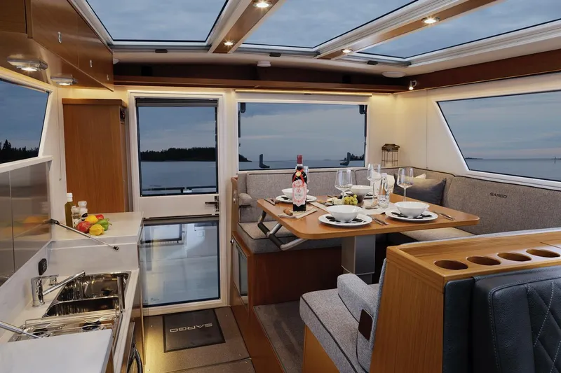 Slide: The Image of Interior of 2025 Sargo 45 Cat A yacht with dining table and navigation area. - 21