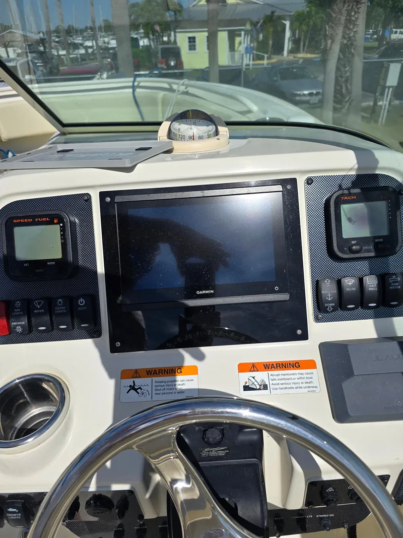 Slide: The Image of Dashboard of a 2008 Hydra-Sports Vector 2200 DC boat with navigation instruments. - 14