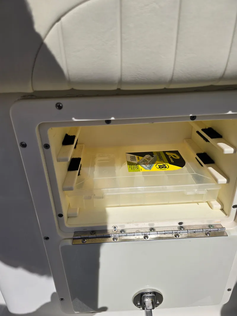 Slide: The Image of Open storage compartment on a 2008 Hydra-Sports Vector 2200 DC boat. - 27