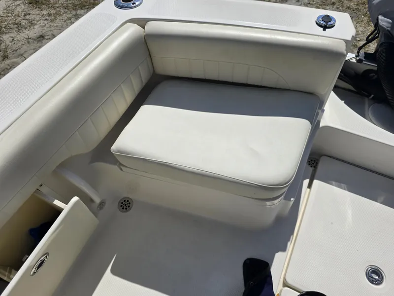 Slide: The Image of 2008 Hydra-Sports Vector 2200 DC boat interior with white cushioned seating. - 29