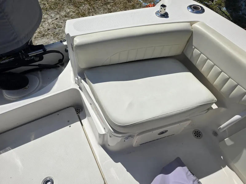 Slide: The Image of 2008 Hydra-Sports Vector 2200 DC boat seating area with white cushioned seats. - 30