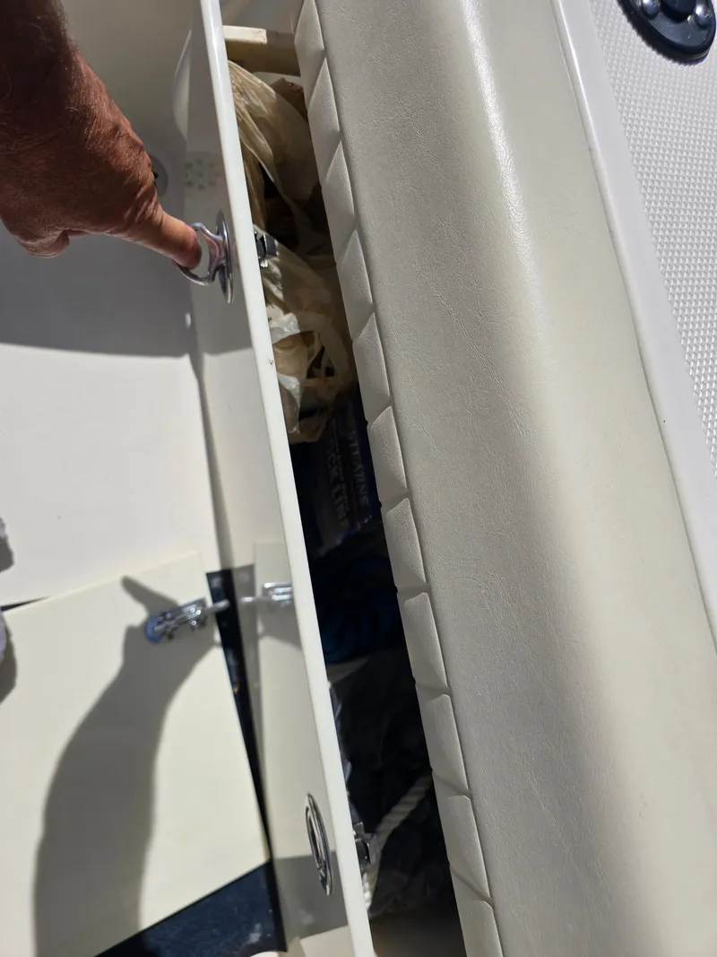 Slide: The Image of Opening storage compartment on 2008 Hydra-Sports Vector 2200 DC boat. - 32